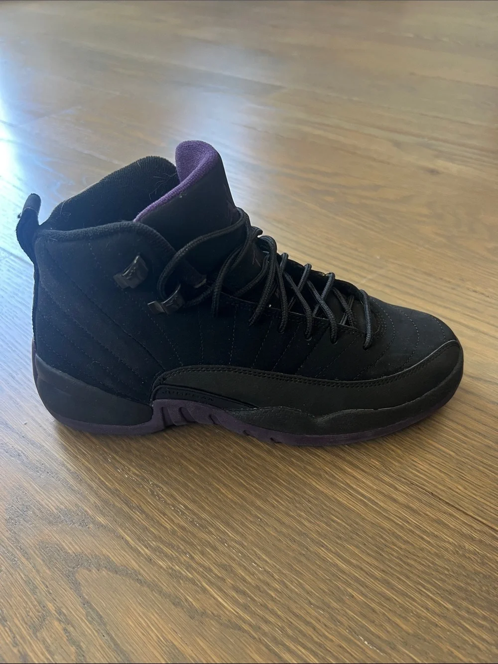 Jordan High-Top Sneakers in Black and Purple